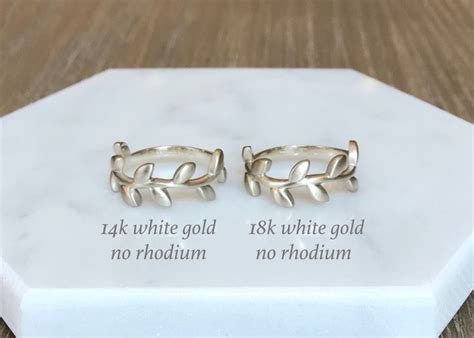 14k vs 18k white gold - Jan 25, 2023 · Believe it or not, yellow gold and white gold are frequently equal in cost. This is especially true if the percentage of pure gold is the same. For example, 14K white gold will be comparable in cost to 14K yellow gold. In some instances, white gold may be slightly more expensive due to the rhodium plating. 